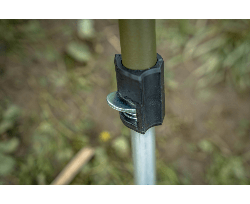 Close-up of a fishing chair pole clamp showing secure attachment and durable materials for optimal performance.